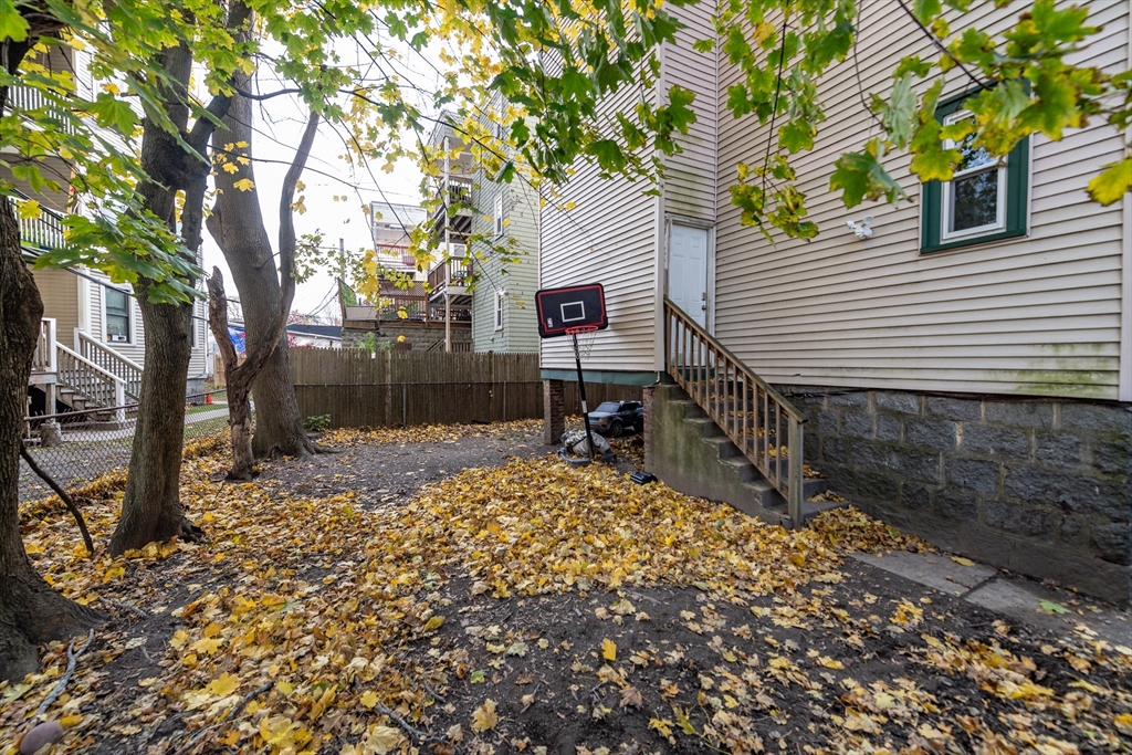 18 Santuit Street Boston, MA 02124 - Photo 7 of 17 a house view with a backyard space