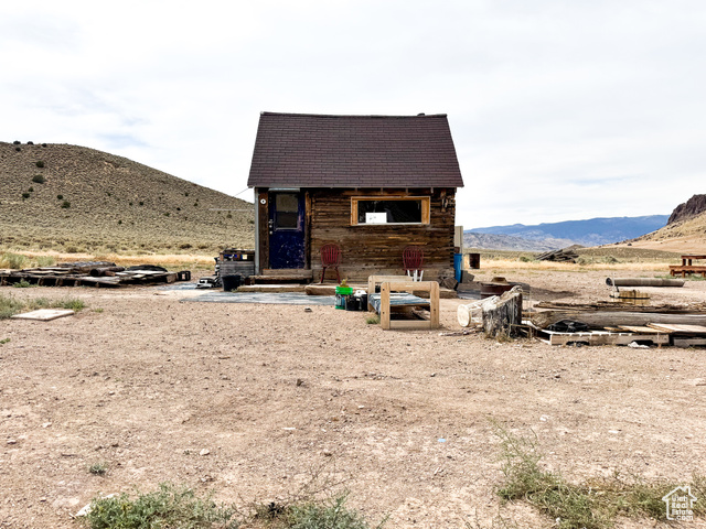 Undisclosed Address Monroe, UT 84754 - Photo 23 of 39 View of outbuilding with a mountain view and roof with shingles