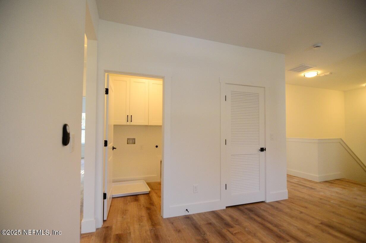 12724 Danbrook Street Jacksonville, FL 32223 - Photo 19 of 42 a view of a bathroom with wooden floor