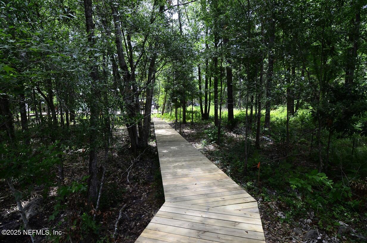 12724 Danbrook Street Jacksonville, FL 32223 - Photo 35 of 42 a view of a pathway with a yard