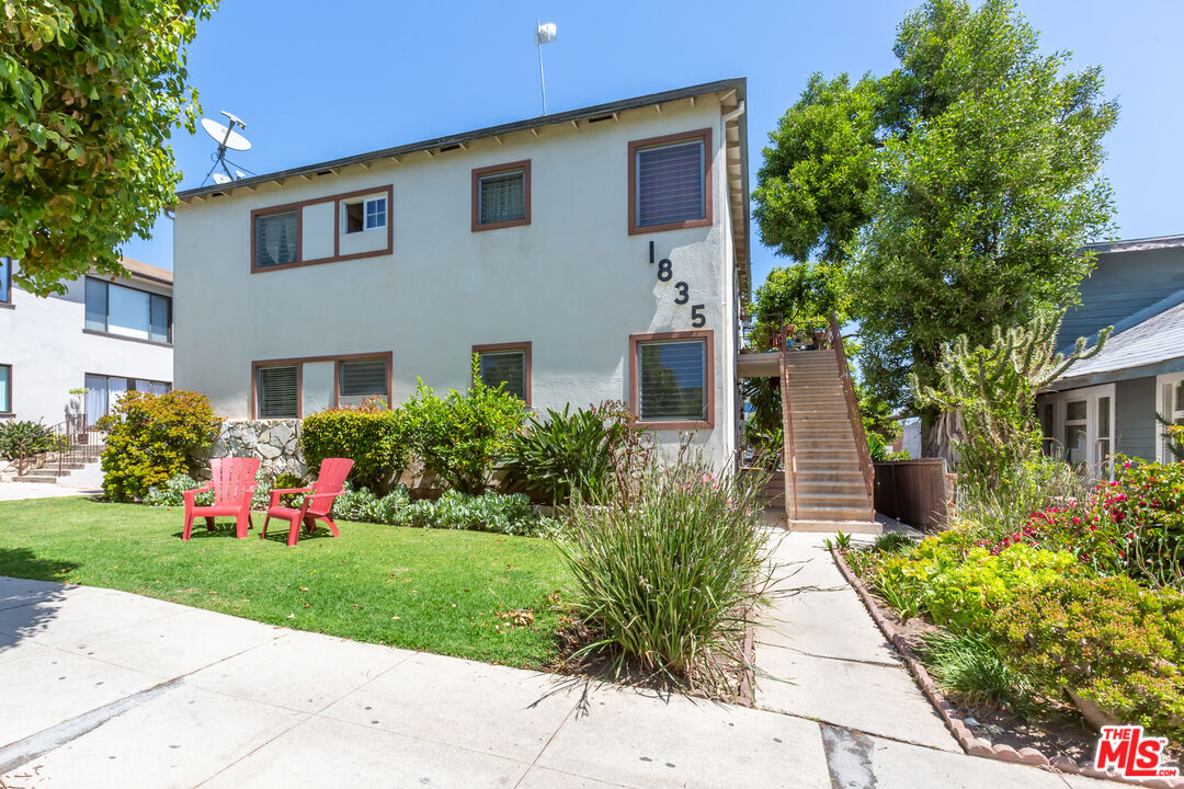 1835 7th Street, Unit D Santa Monica, CA 90401 - Photo 2 of 9 a front view of a house with a garden