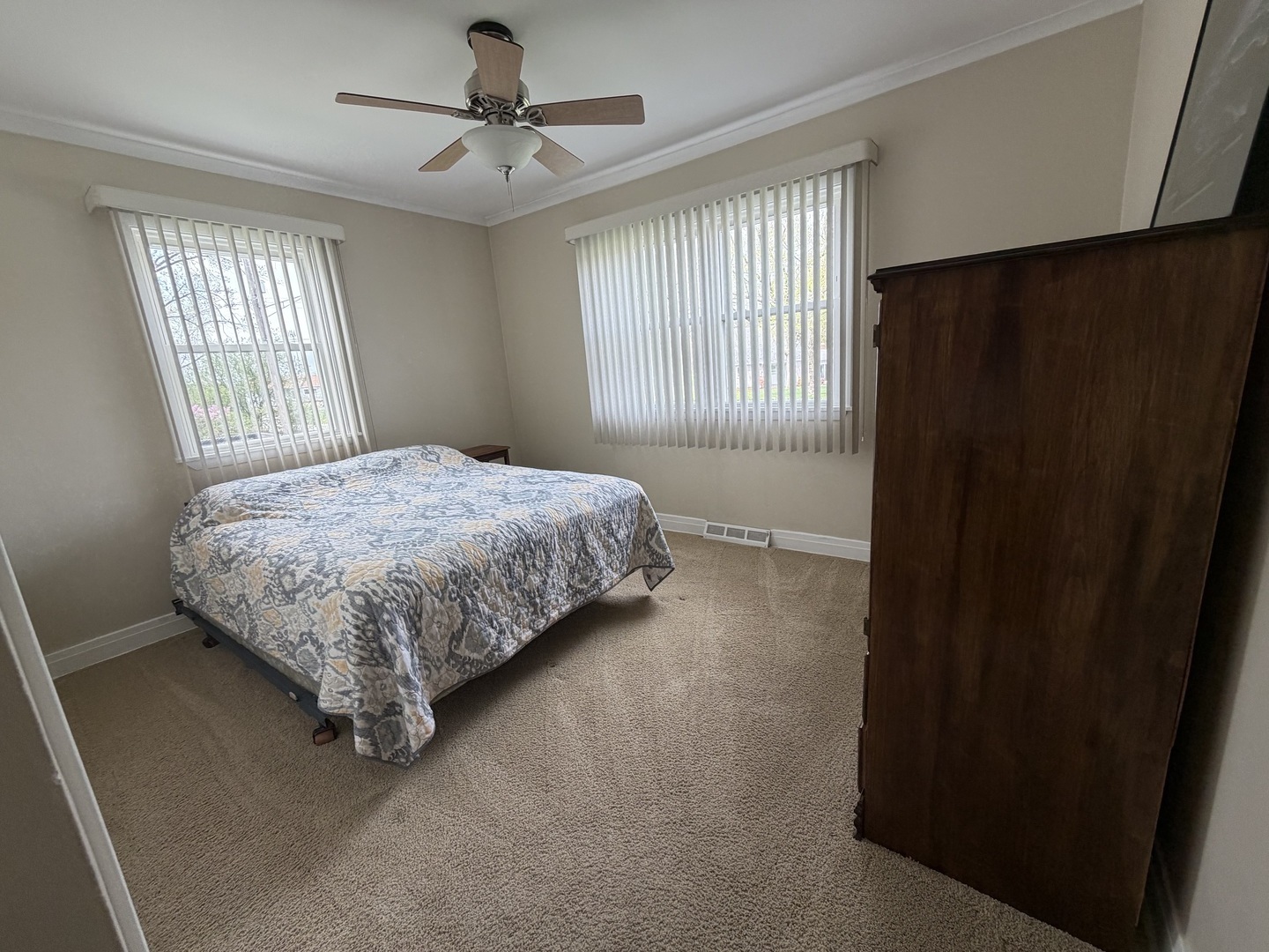 3935 Arthur Terrace Court Markham, IL 60428 - Photo 11 of 22 a bedroom with a bed and windows