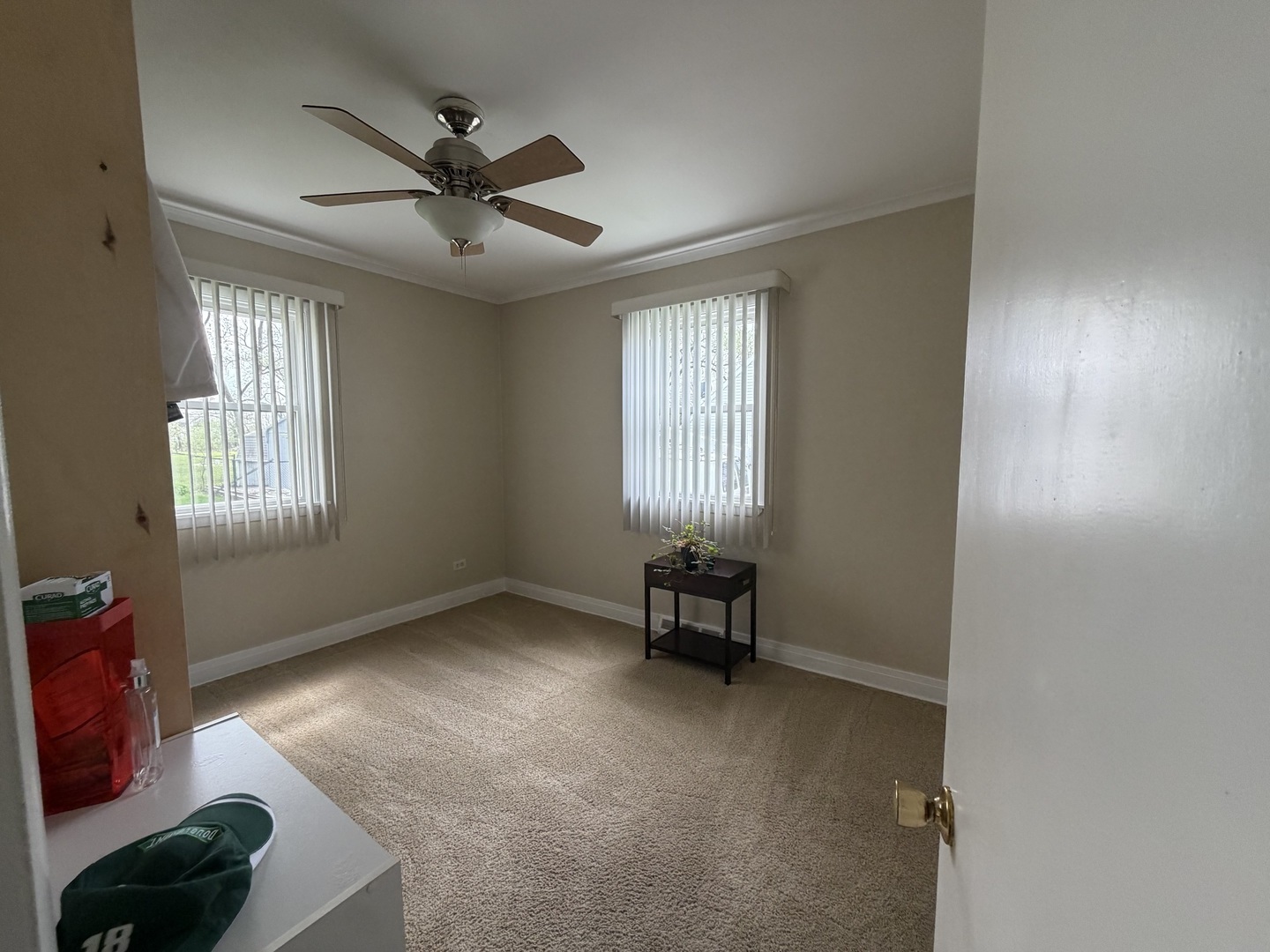 3935 Arthur Terrace Court Markham, IL 60428 - Photo 12 of 22 a furnished livingroom with windows and ceiling fan