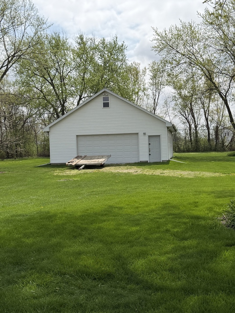 3935 Arthur Terrace Court Markham, IL 60428 - Photo 16 of 22 a big house with a big yard and large trees