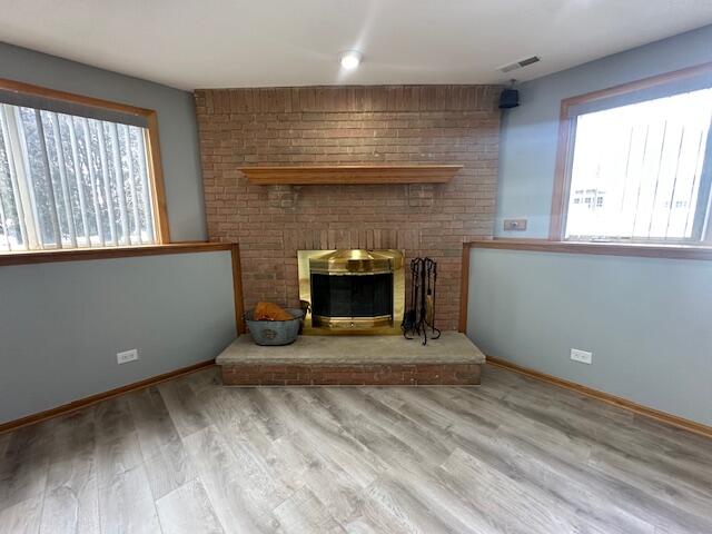 9924 Lands End Munster, IN 46321 - Photo 12 of 42 an empty room with windows and fireplace