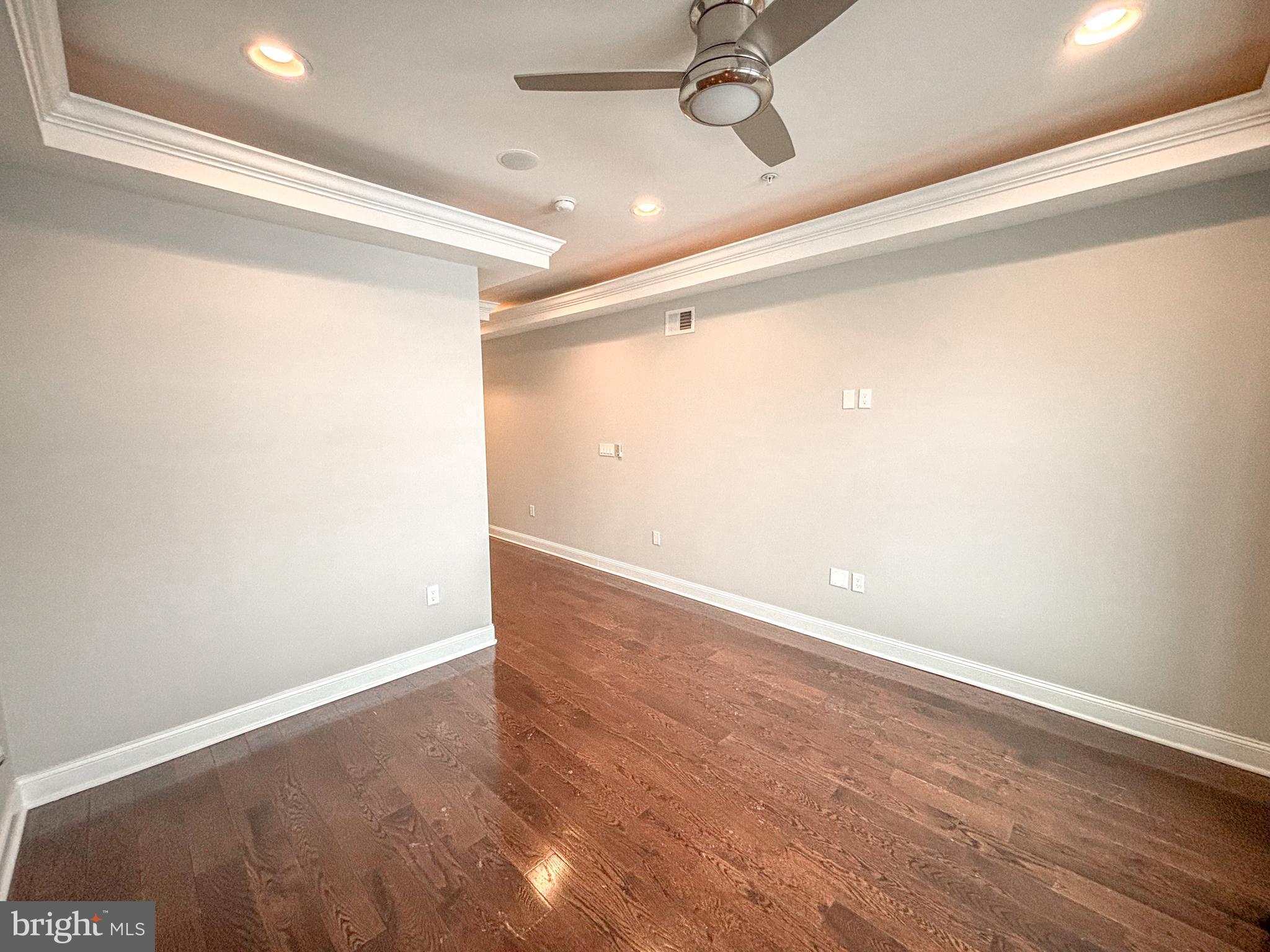 1526 South Cleveland Street Philadelphia, PA 19146 - Photo 18 of 30 en empty room with wooden floor