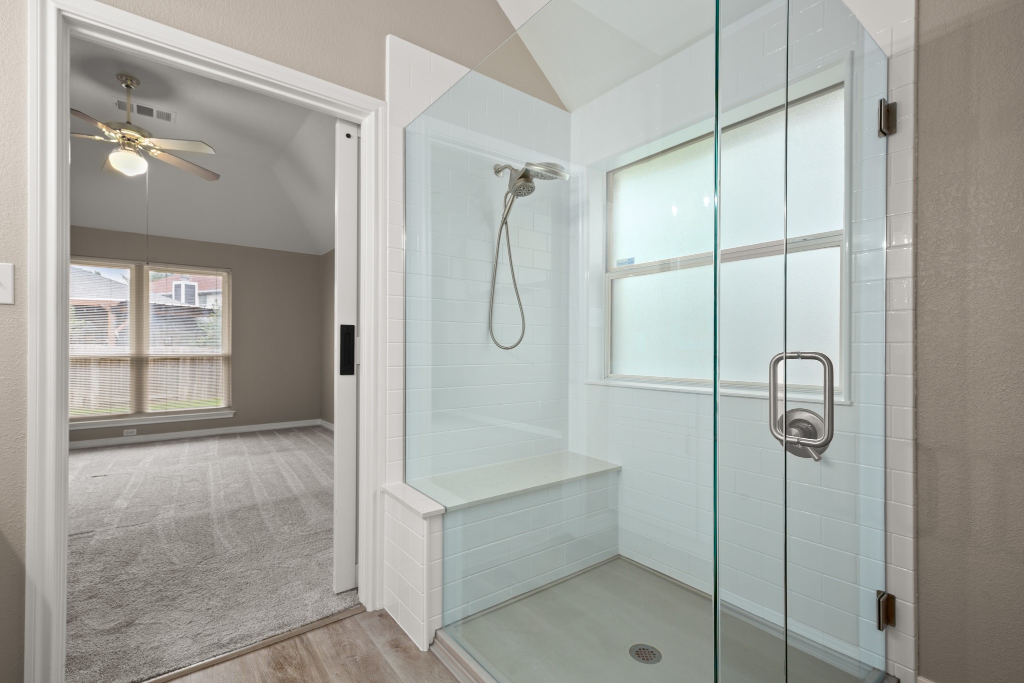 3420 Ribbon Reef Lane Austin, TX 78728 - Photo 14 of 25 Recently updated primary bath with oversized, walk-in shower and glass surround