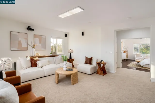 a living room with furniture and a couch