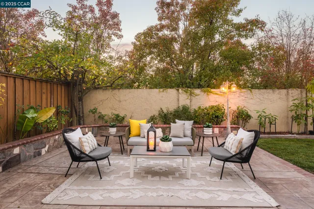 a chairs and a table in a patio