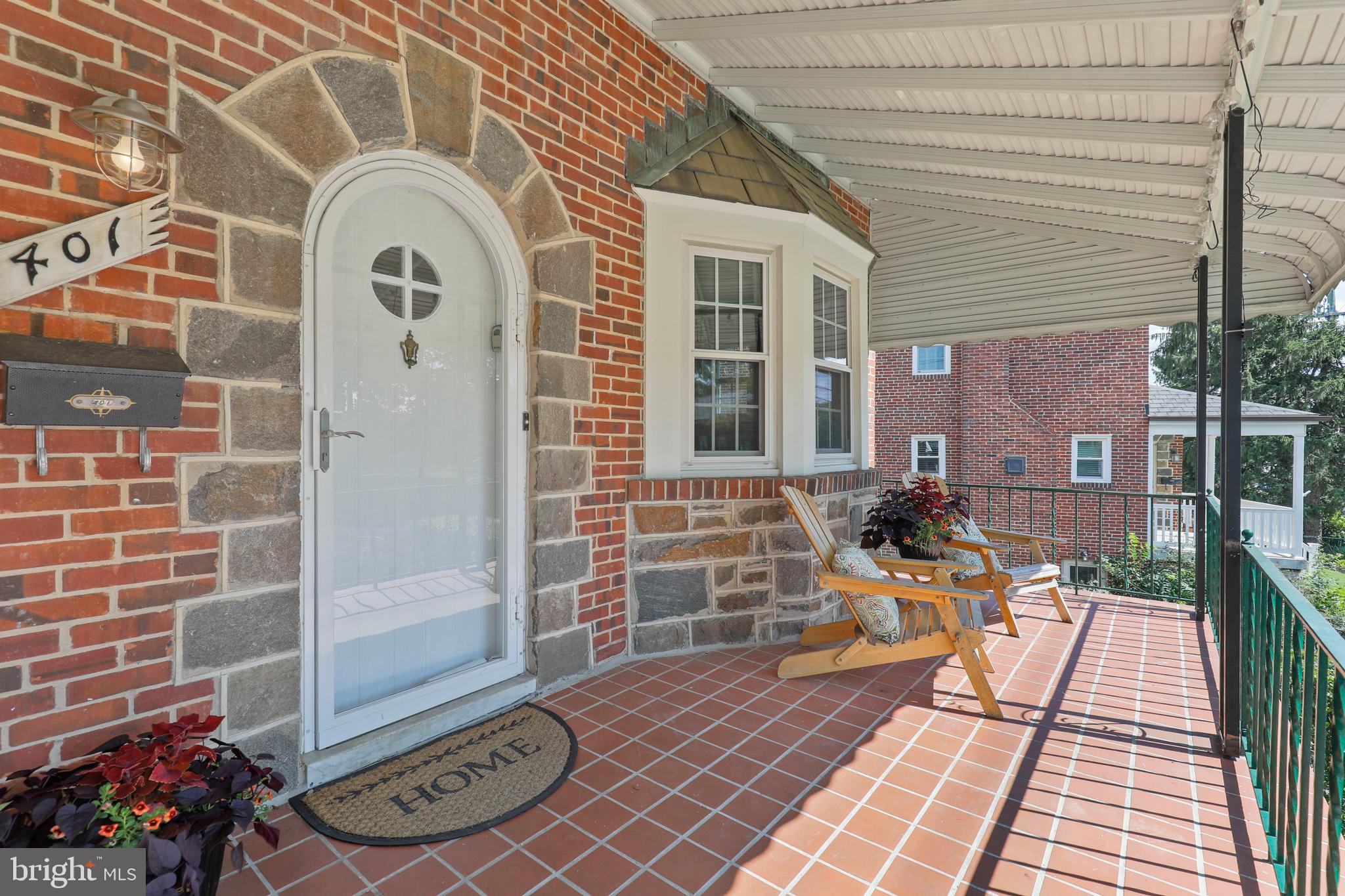 401 Academy Road Baltimore, MD 21228 - Photo 5 of 46 Details include bay window, stone & arch top door