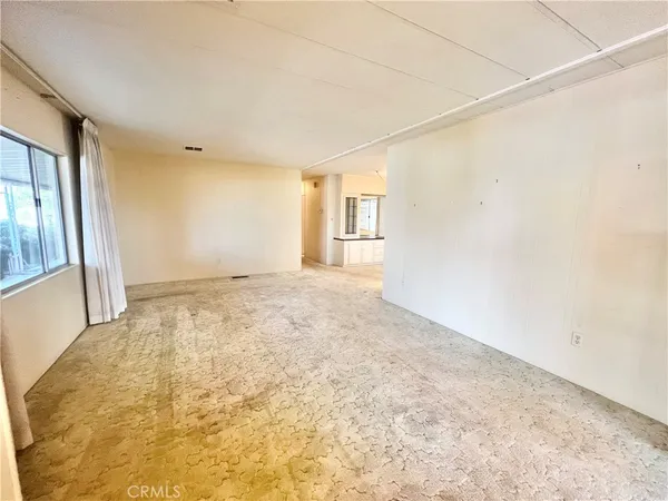 an empty room with a natural light