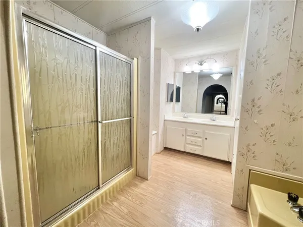 a view of storage and utility room with washer and dryer