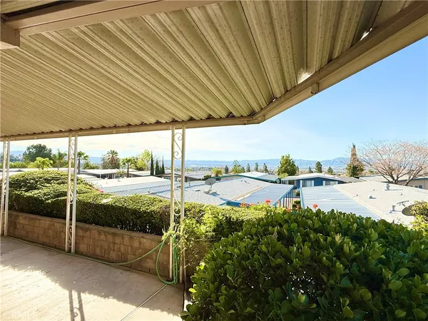 a view of swimming pool from a balcony