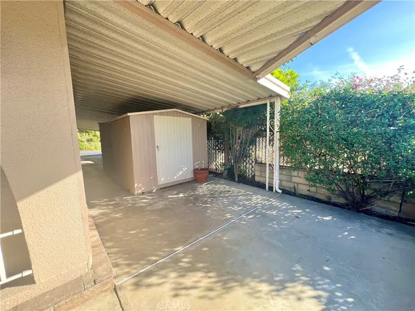 a view of a backyard of the house