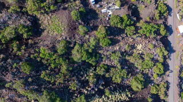 a view of a large body of water and mountain