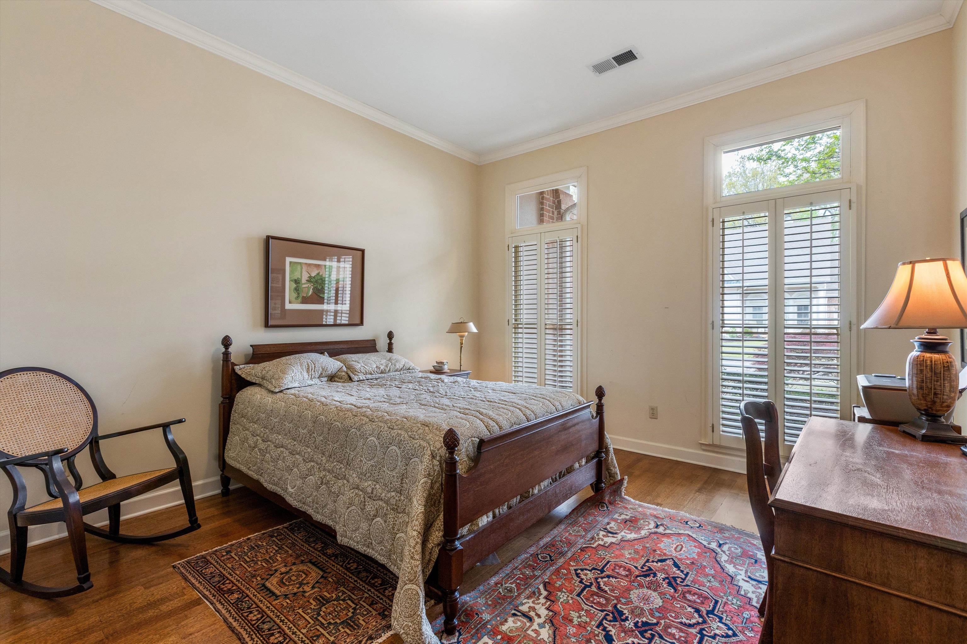 1707 Wainwright Court Collierville, TN 38017 - Photo 13 of 24 a bedroom with a bed a table and chair