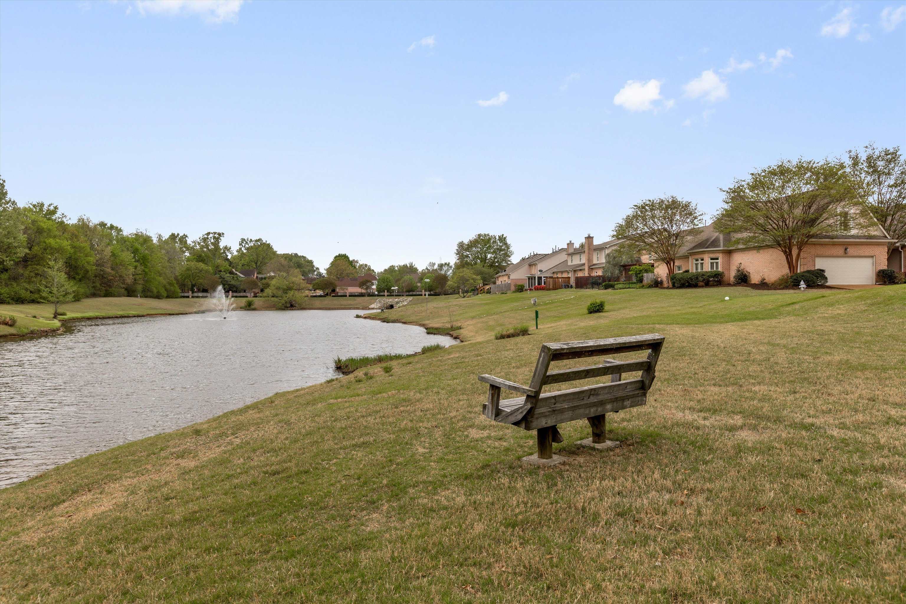 1707 Wainwright Court Collierville, TN 38017 - Photo 21 of 24 a view of a lake with a big yard