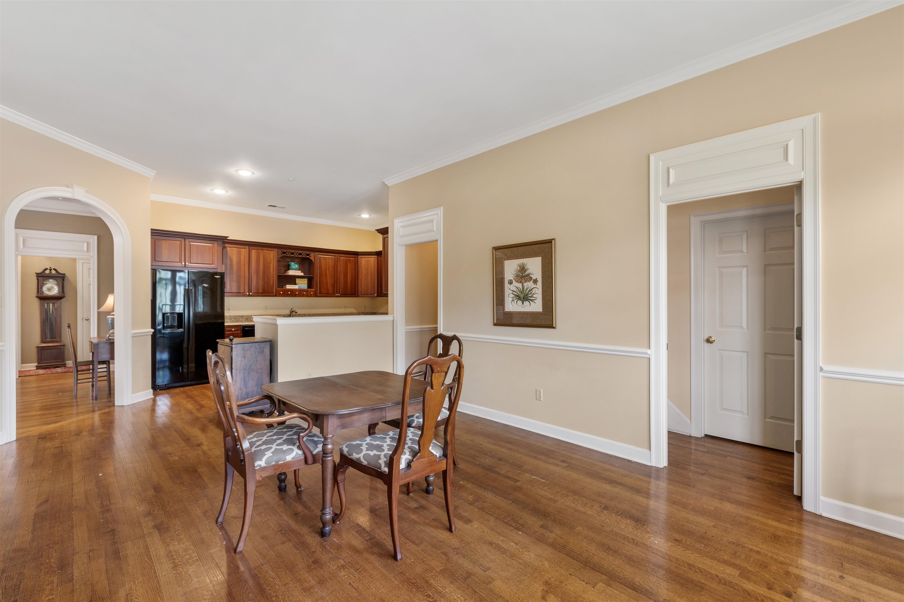 1707 Wainwright Court Collierville, TN 38017 - Photo 24 of 24 a view of a dining room with furniture and wooden floor