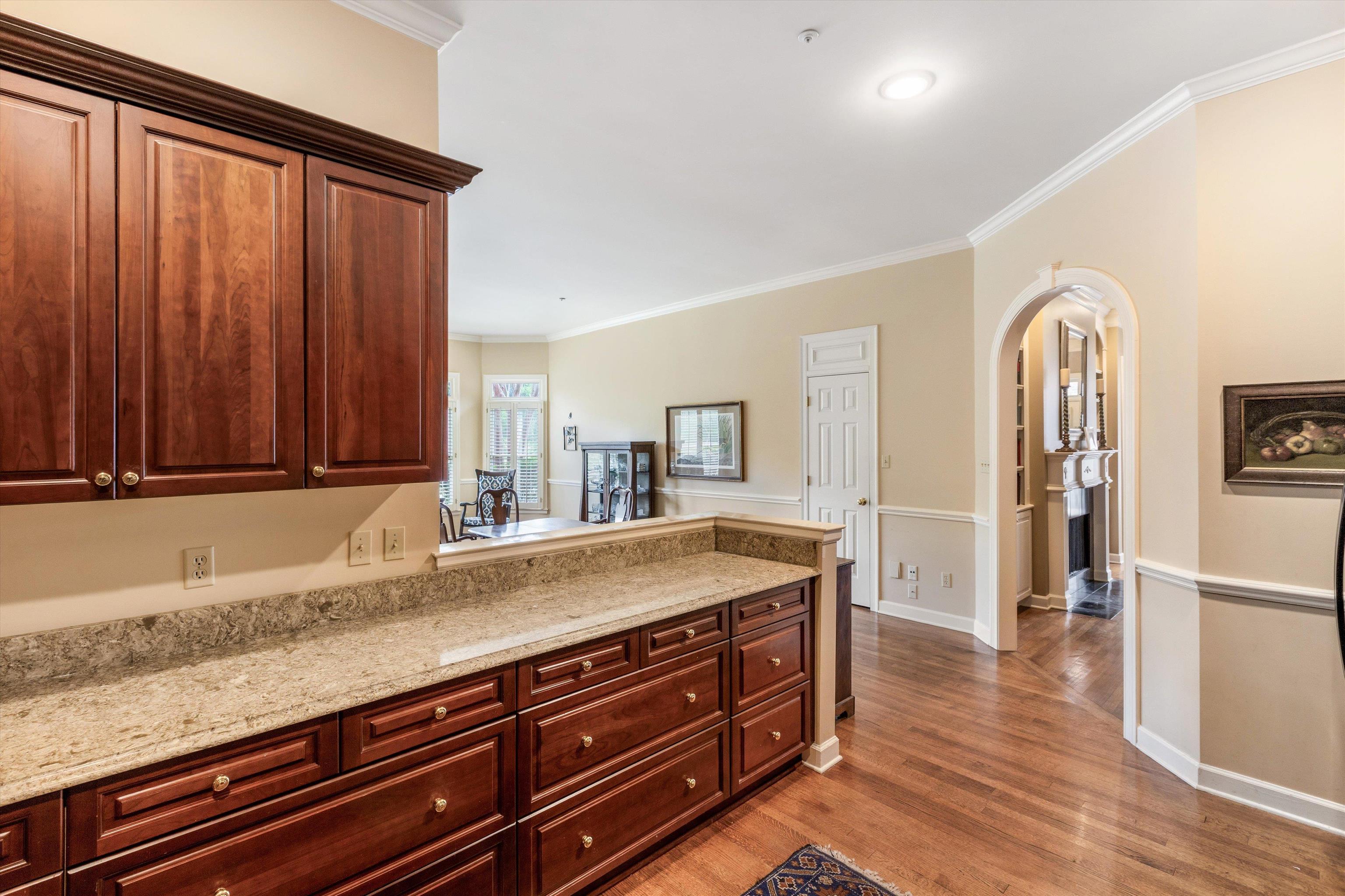 1707 Wainwright Court Collierville, TN 38017 - Photo 6 of 24 a view of a kitchen counter space and wooden floor