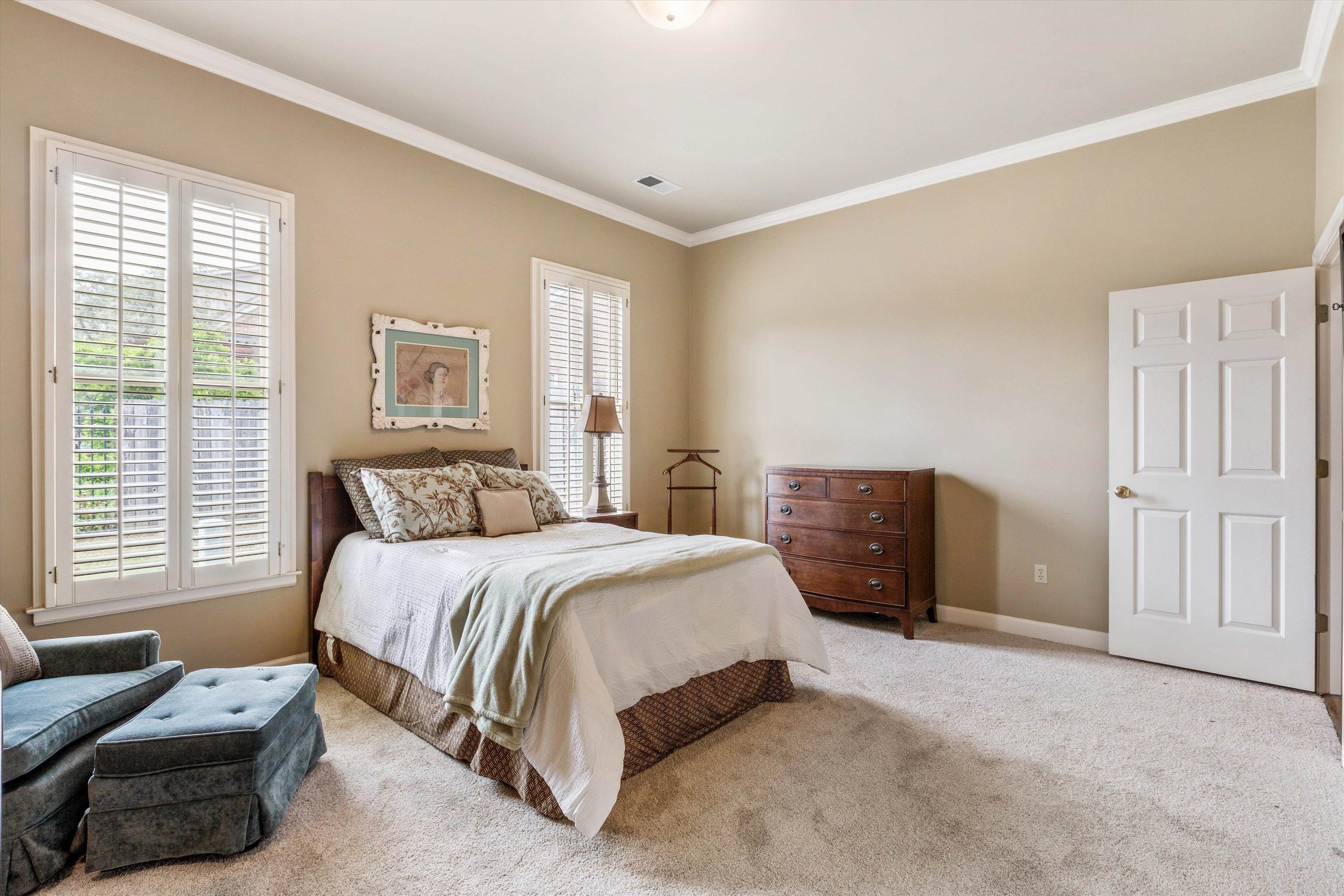 1707 Wainwright Court Collierville, TN 38017 - Photo 10 of 24 a bedroom with a bed and a couch