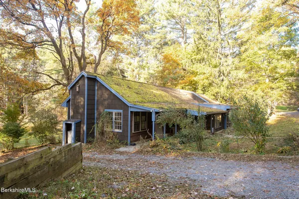 front view of a house with a trees
