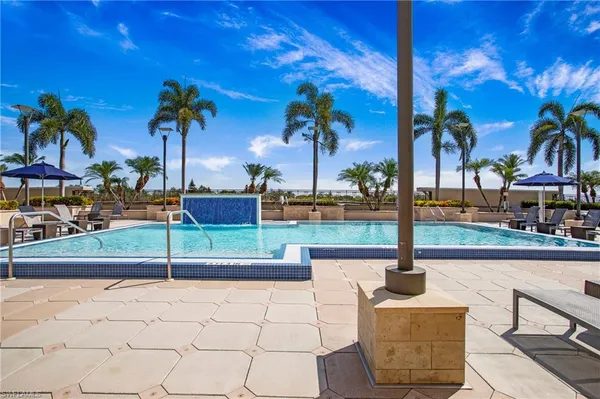 a view of a patio with a fountain
