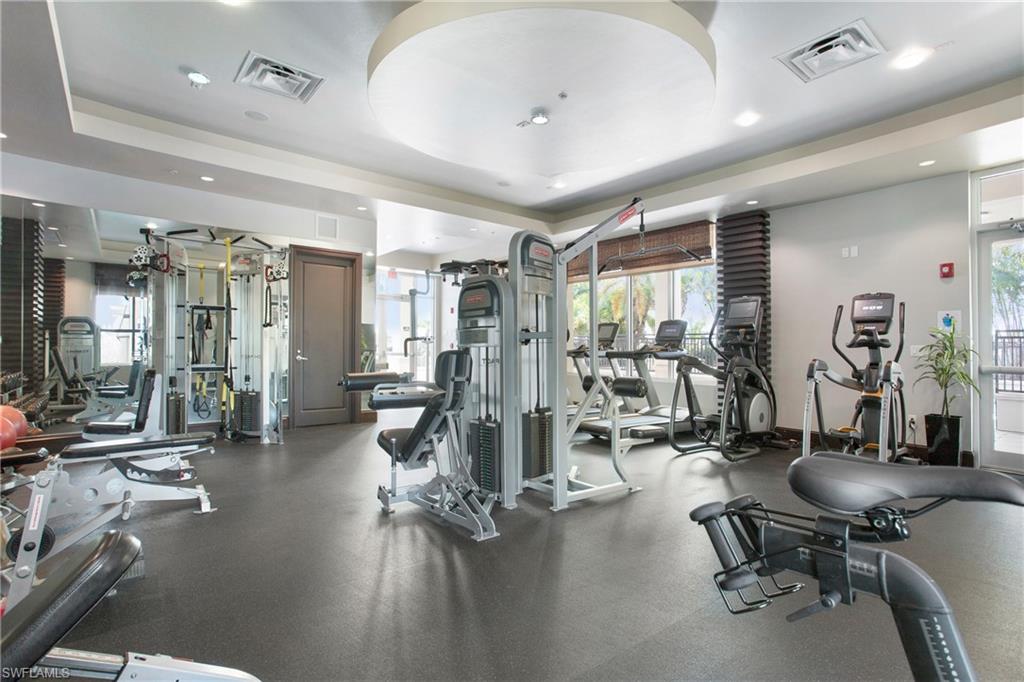 9123 Strada Place, Unit 7307 Naples, FL 34108 - Photo 41 of 49 a view of a room with gym equipment