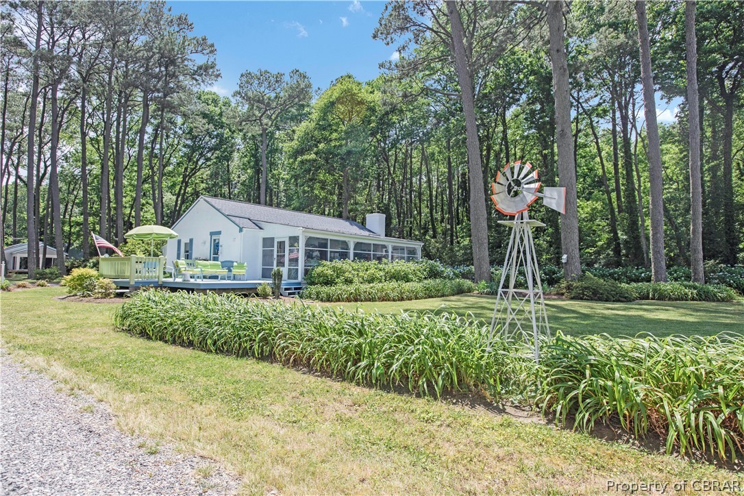 175 Seaside Way Gwynn, VA 23076 - Photo 7 of 48 a front view of a house with a yard
