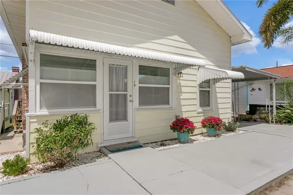 a front view of a house with an outdoor space