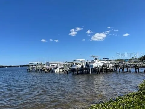 a view of ocean with boats