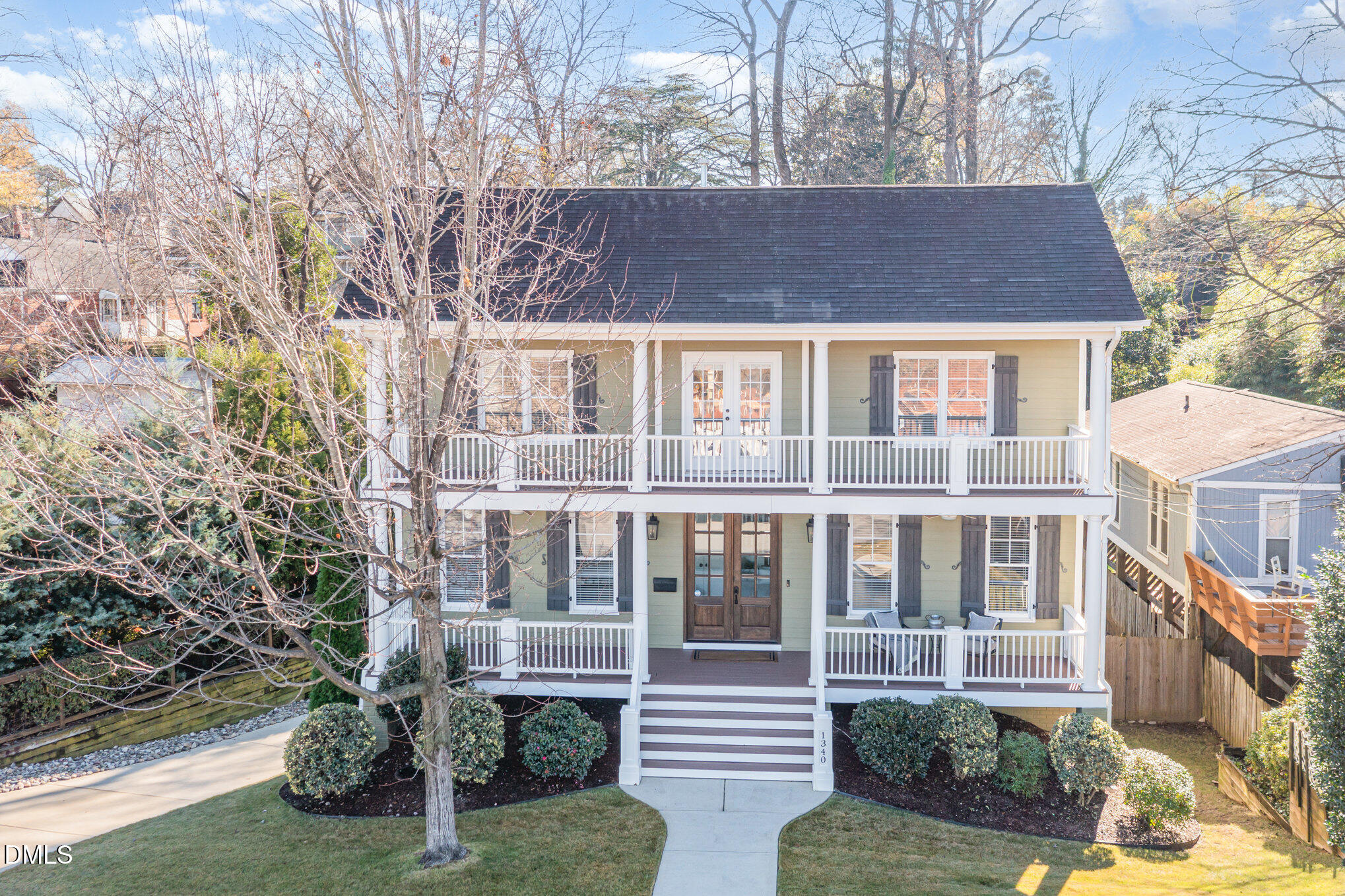 1340 Courtland Drive Raleigh, NC 27604 - Photo 2 of 42 front view of a house with a yard