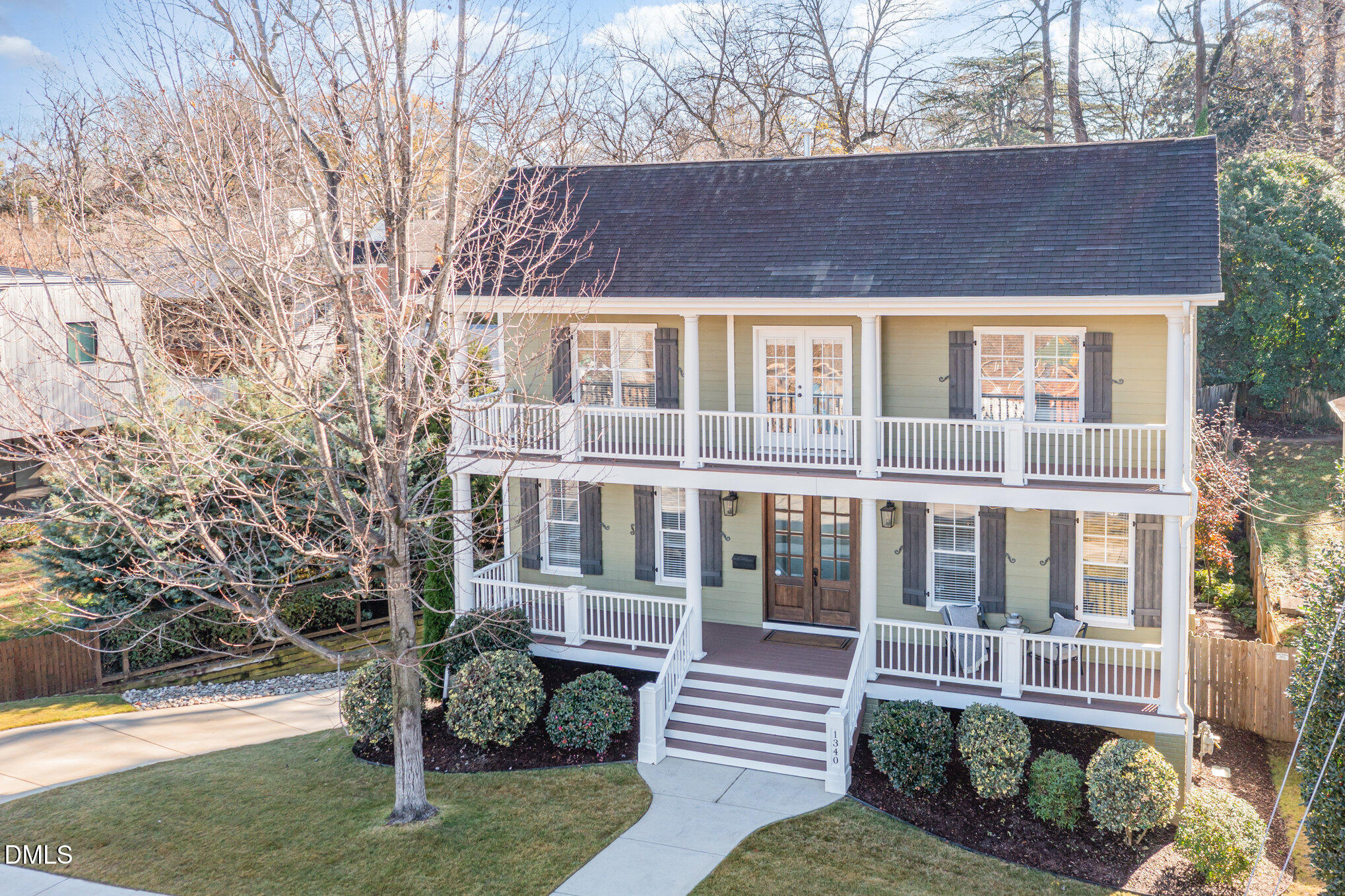 1340 Courtland Drive Raleigh, NC 27604 - Photo 37 of 42 a view of house with a yard and wooden fence