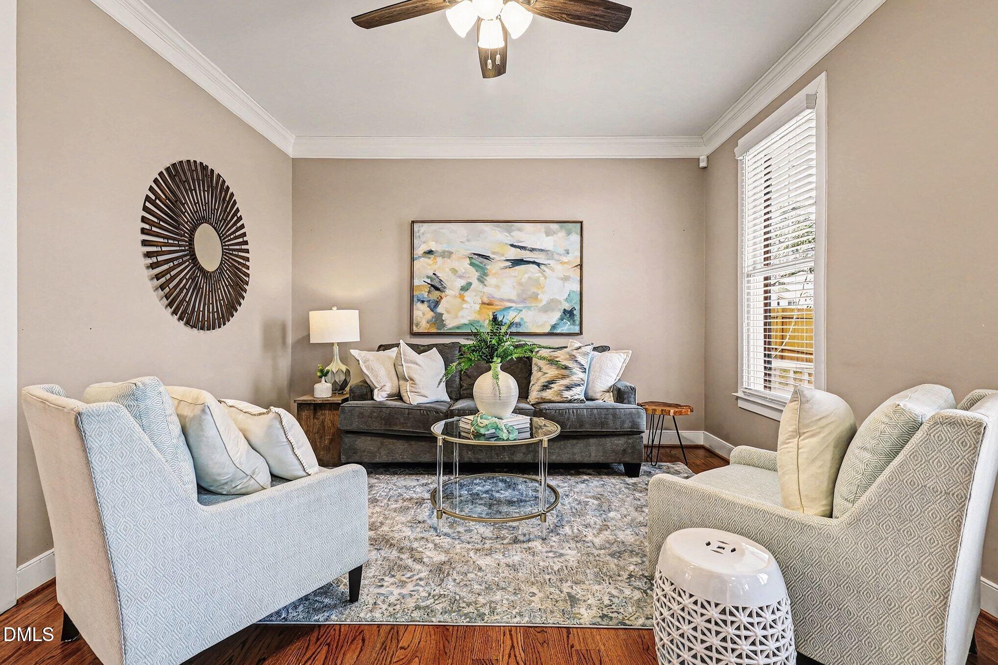 1340 Courtland Drive Raleigh, NC 27604 - Photo 8 of 42 a living room with furniture and a large window