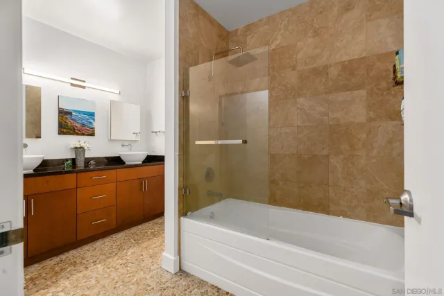 a bathroom with a bathtub sink and toilet