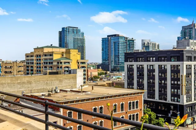 a view of a balcony with city view