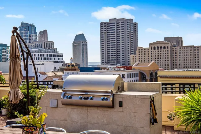 a view of city with tall buildings