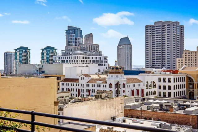a view of a balcony with city view