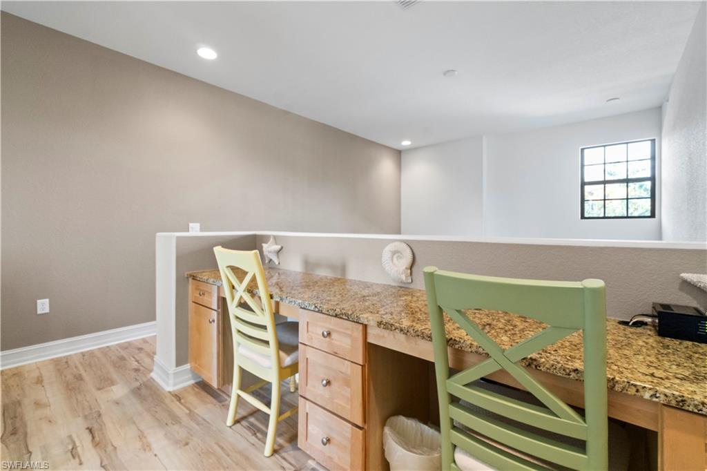 9111 Capistrano Street South, Unit 8303 Naples, FL 34113 - Photo 14 of 29 a view of a livingroom with furniture