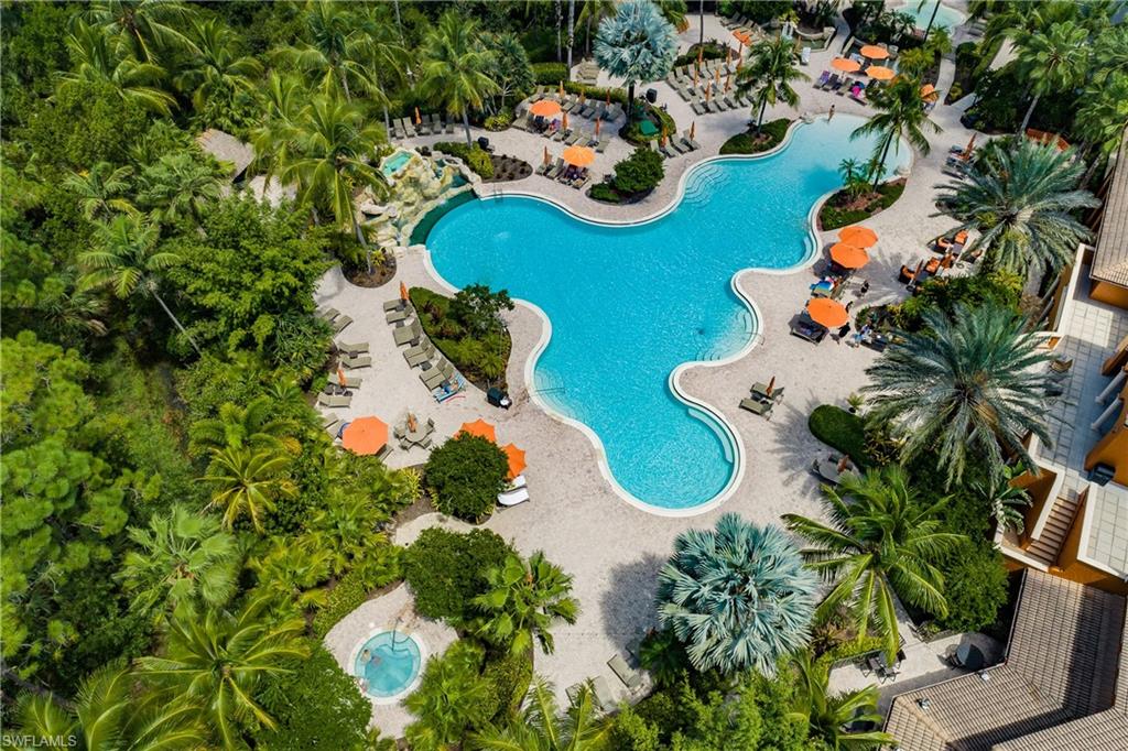 9111 Capistrano Street South, Unit 8303 Naples, FL 34113 - Photo 17 of 29 a vase of flowers sitting on a table