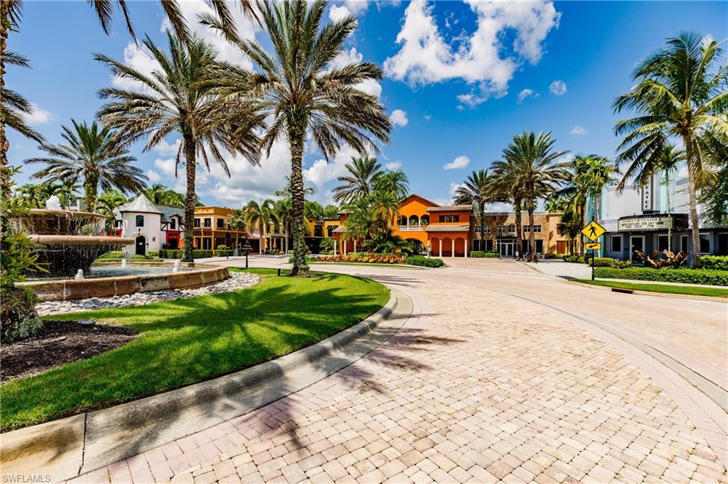 9111 Capistrano Street South, Unit 8303 Naples, FL 34113 - Photo 19 of 29 a park with palm trees