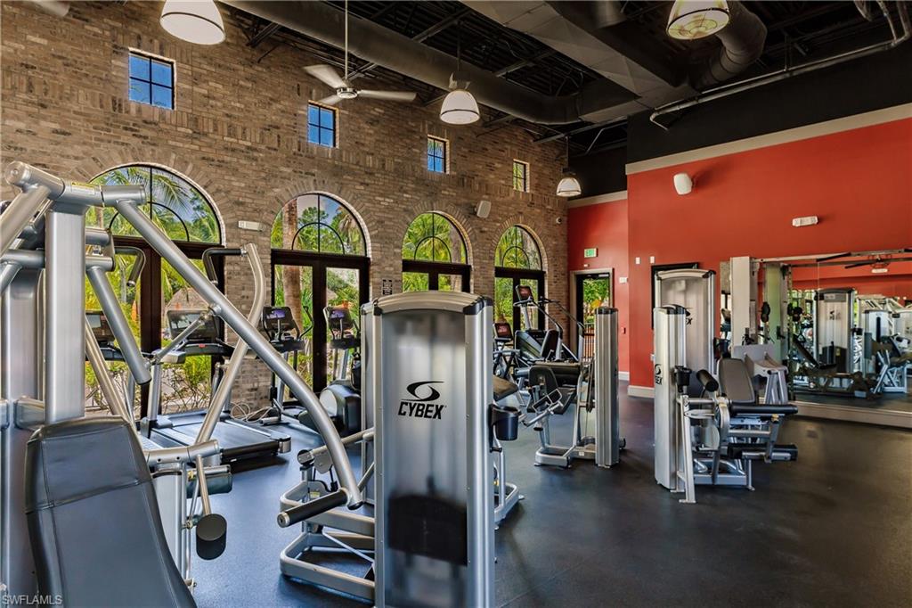 9111 Capistrano Street South, Unit 8303 Naples, FL 34113 - Photo 21 of 29 a view of a room with gym equipment