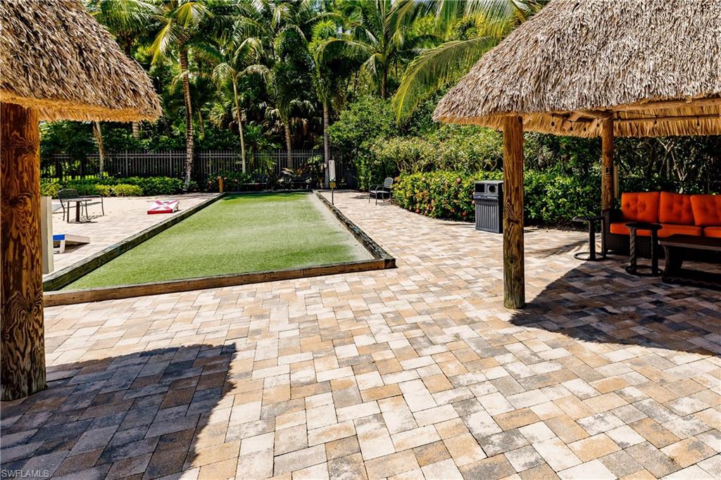 9111 Capistrano Street South, Unit 8303 Naples, FL 34113 - Photo 28 of 29 a view of a backyard