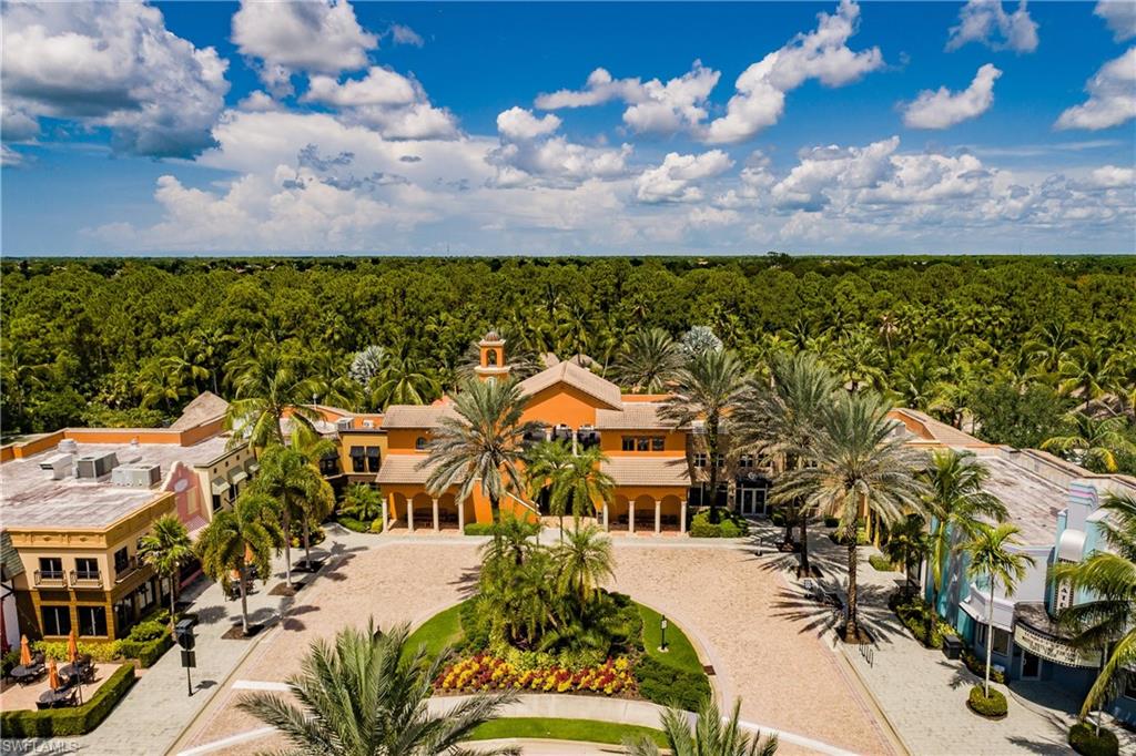 9111 Capistrano Street South, Unit 8303 Naples, FL 34113 - Photo 29 of 29 an aerial view of residential houses with outdoor space