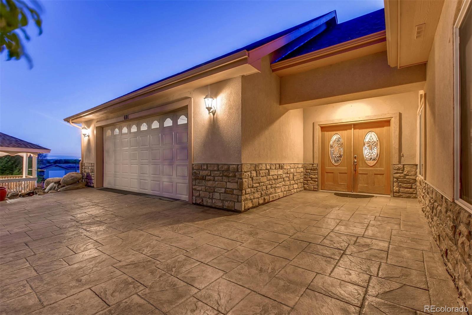 691 Picadilly Road Aurora, CO 80018 - Photo 2 of 27 a view of a house with a yard