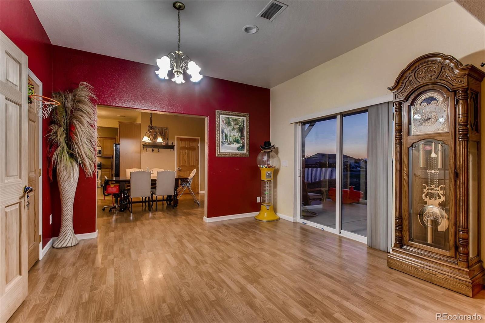 691 Picadilly Road Aurora, CO 80018 - Photo 21 of 27 a view of a room with wooden floor closet and windows