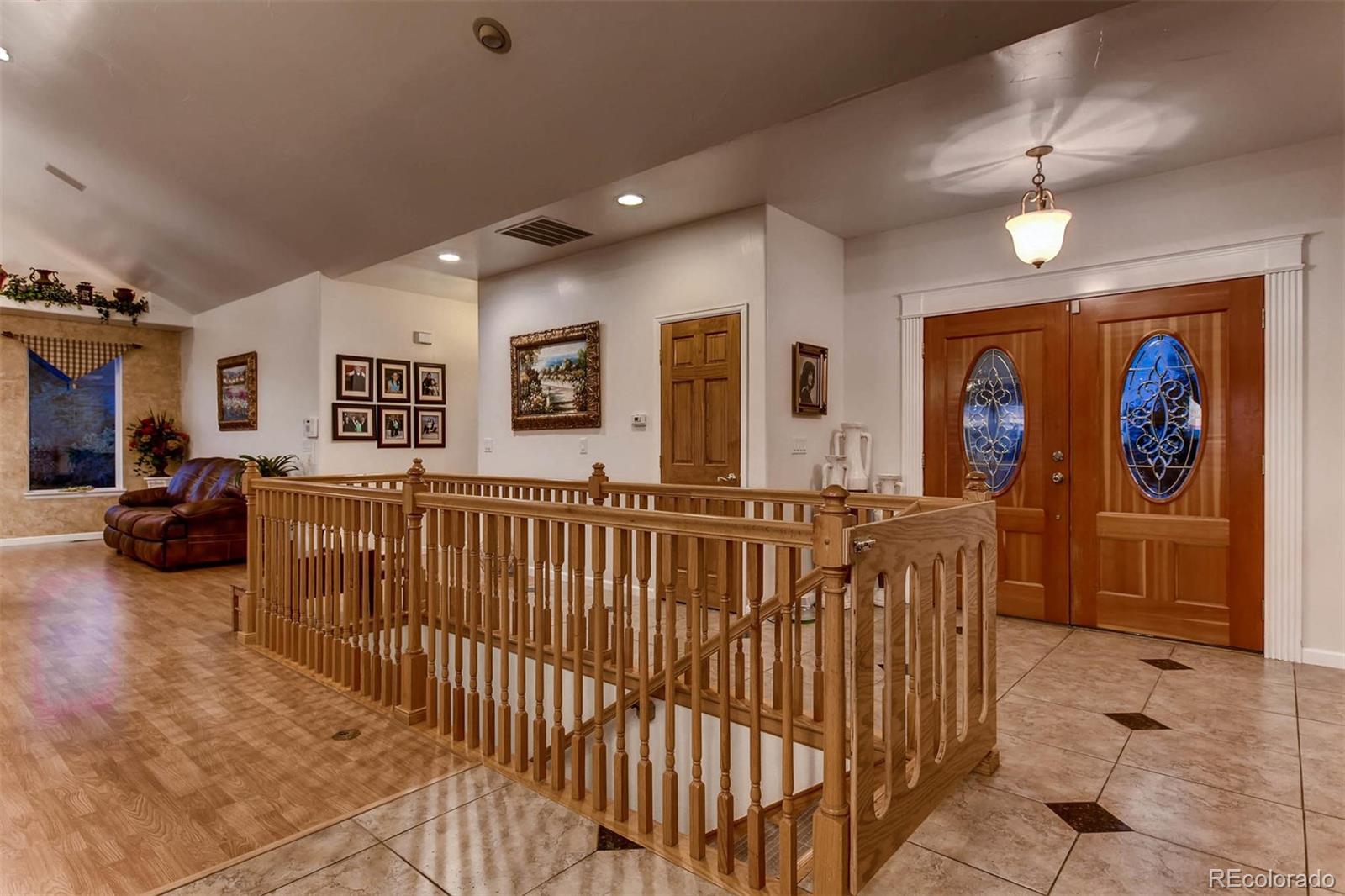 691 Picadilly Road Aurora, CO 80018 - Photo 23 of 27 a bedroom with furniture and a large window
