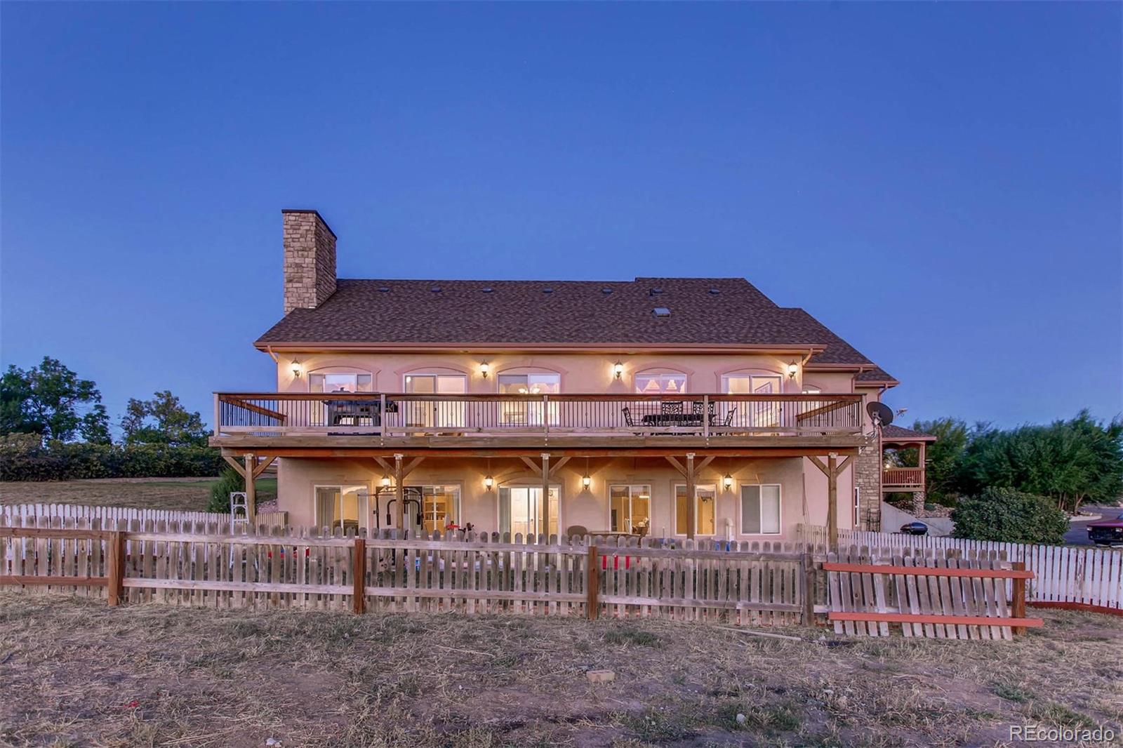 691 Picadilly Road Aurora, CO 80018 - Photo 27 of 27 a front view of a house with a yard
