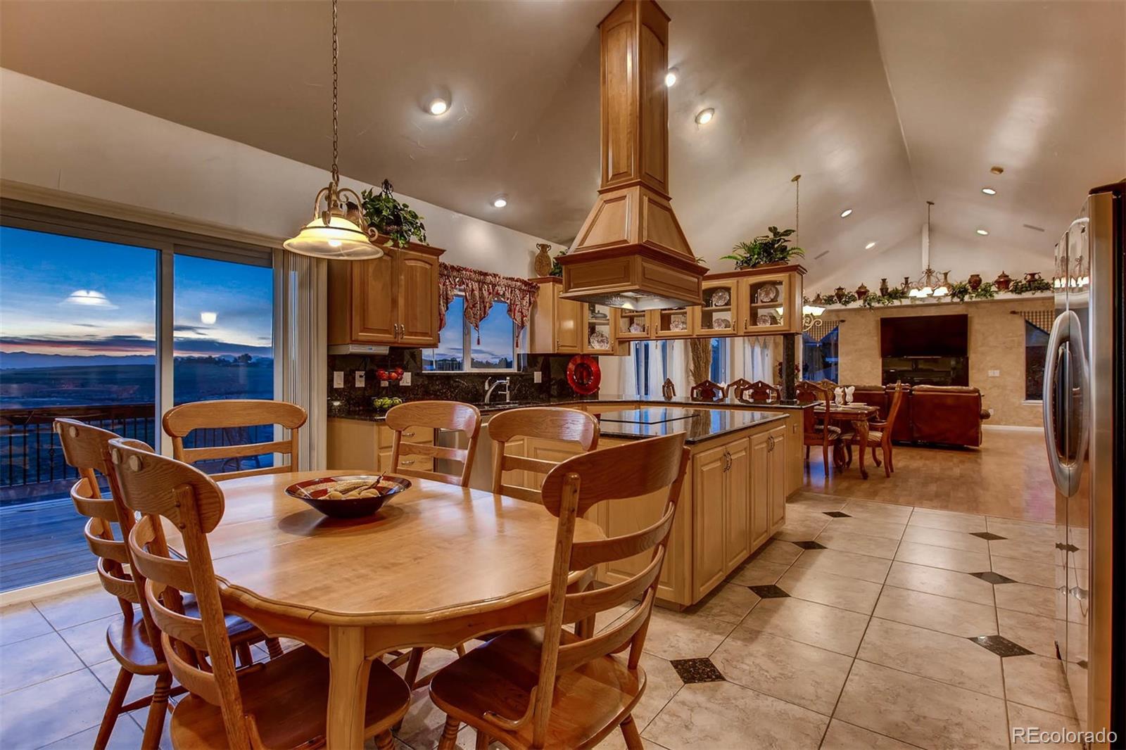 691 Picadilly Road Aurora, CO 80018 - Photo 8 of 27 a view of a dining area with furniture