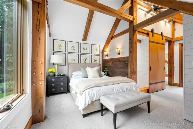 a bathroom with a sink toilet a mirror and shower