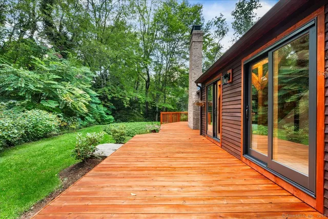 a view of backyard with deck